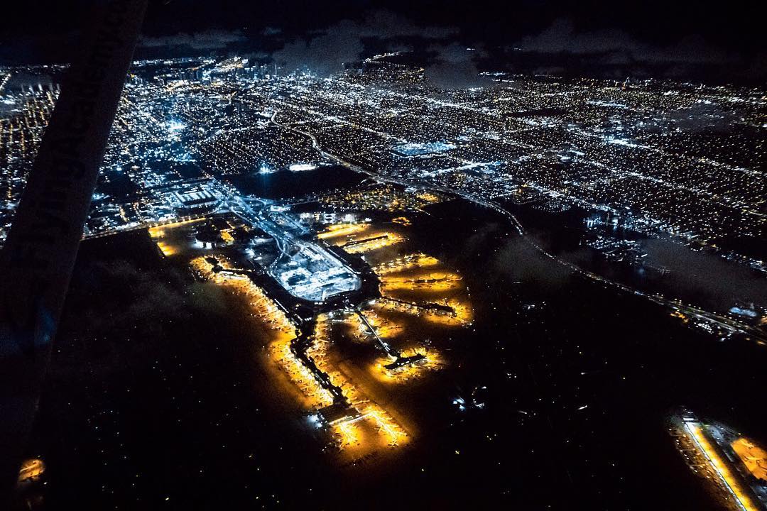 Flying over city at night